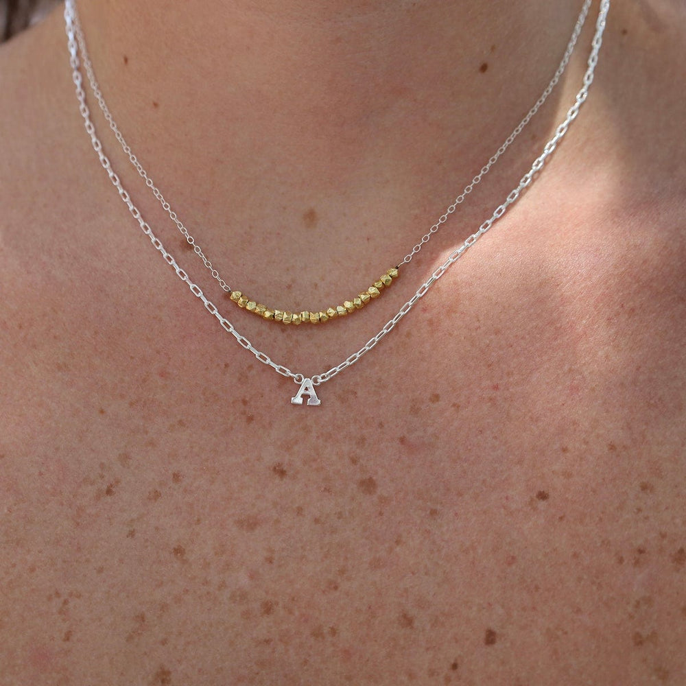 
                      
                        NKL Silver Chain with Gold Vermeil Bead Arc Necklace
                      
                    