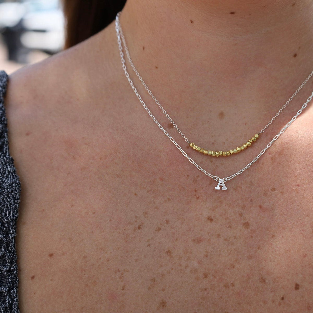 
                      
                        NKL Silver Chain with Gold Vermeil Bead Arc Necklace
                      
                    