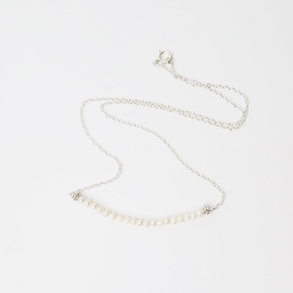 
                      
                        NKL Silver Chain with White Pearl Gemstone Arc Necklace
                      
                    