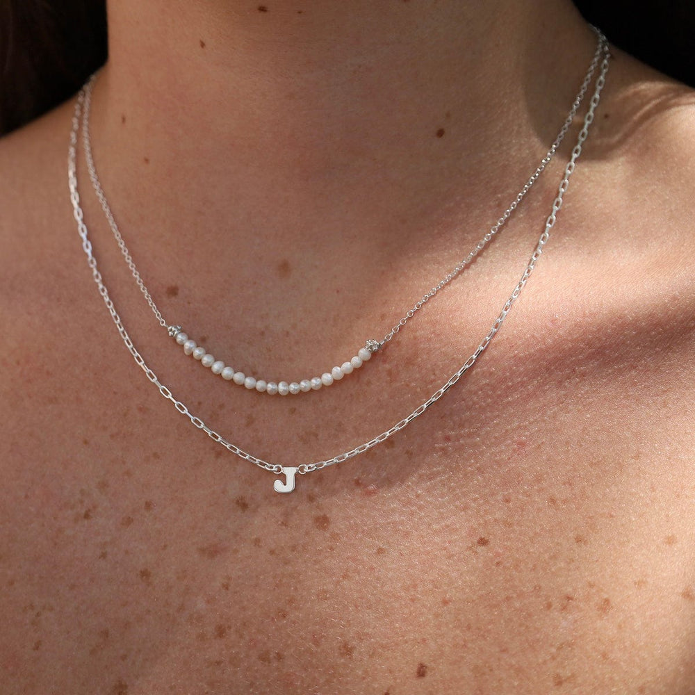 
                      
                        NKL Silver Chain with White Pearl Gemstone Arc Necklace
                      
                    