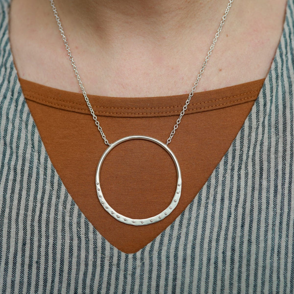 
                  
                    NKL Silver Dot Crescent Necklace
                  
                