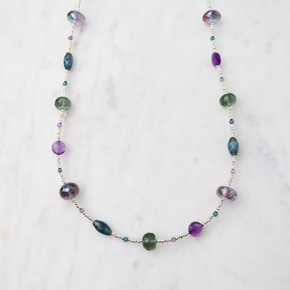 
                      
                        NKL Silver Glass Kyanite, Amethyst & Quartz Necklace
                      
                    