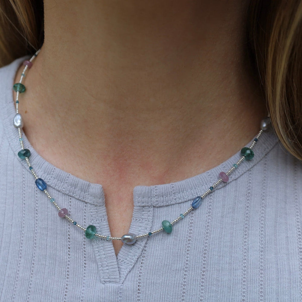 
                      
                        NKL Silver Glass Necklace with Kyanite, Quartz, Pearl, Sapphire, Grandidierite, & Apatite
                      
                    