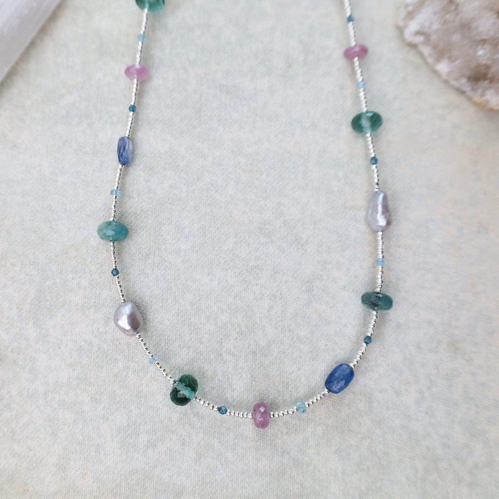 
                      
                        NKL Silver Glass Necklace with Kyanite, Quartz, Pearl, Sapphire, Grandidierite, & Apatite
                      
                    