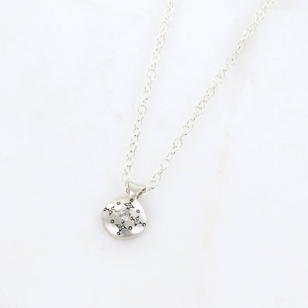 
                      
                        NKL Silver Lights Charm Pendant in Diamond
                      
                    