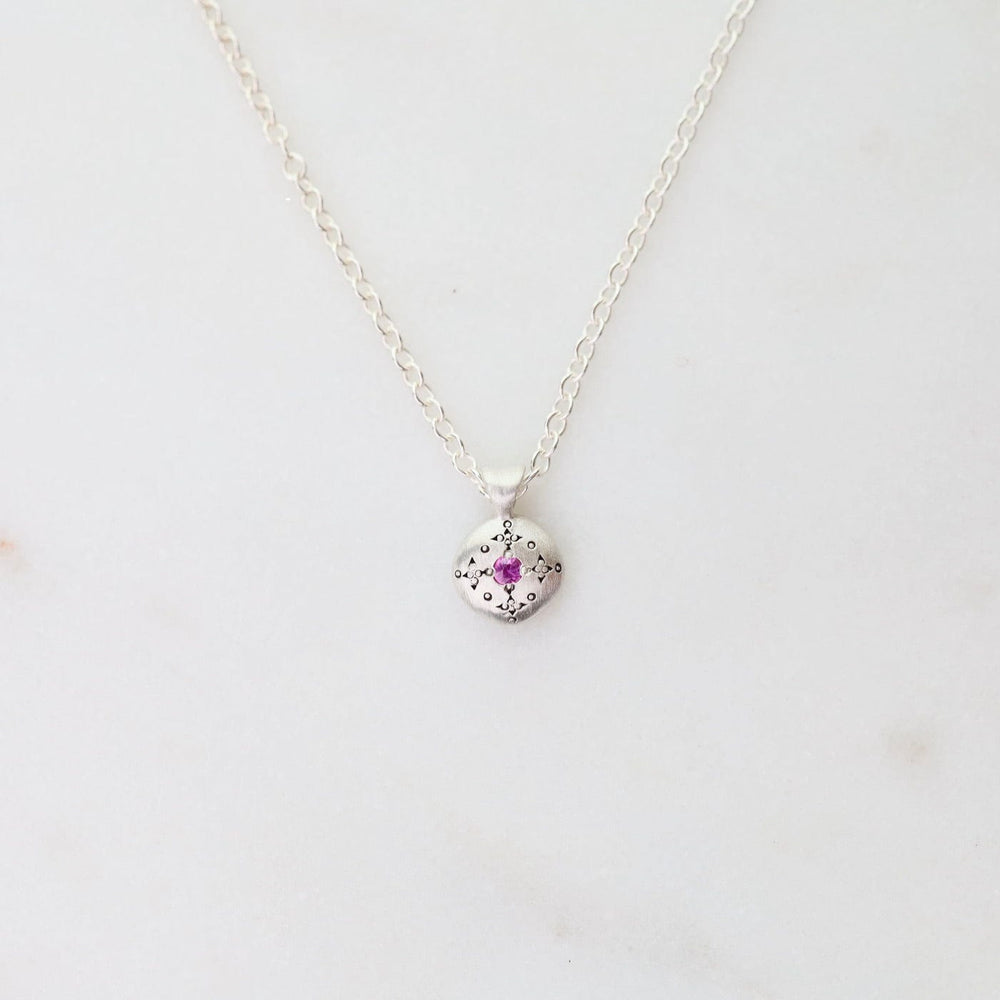 
                      
                        NKL Silver Lights Charm Pendant in Pink Sapphire
                      
                    