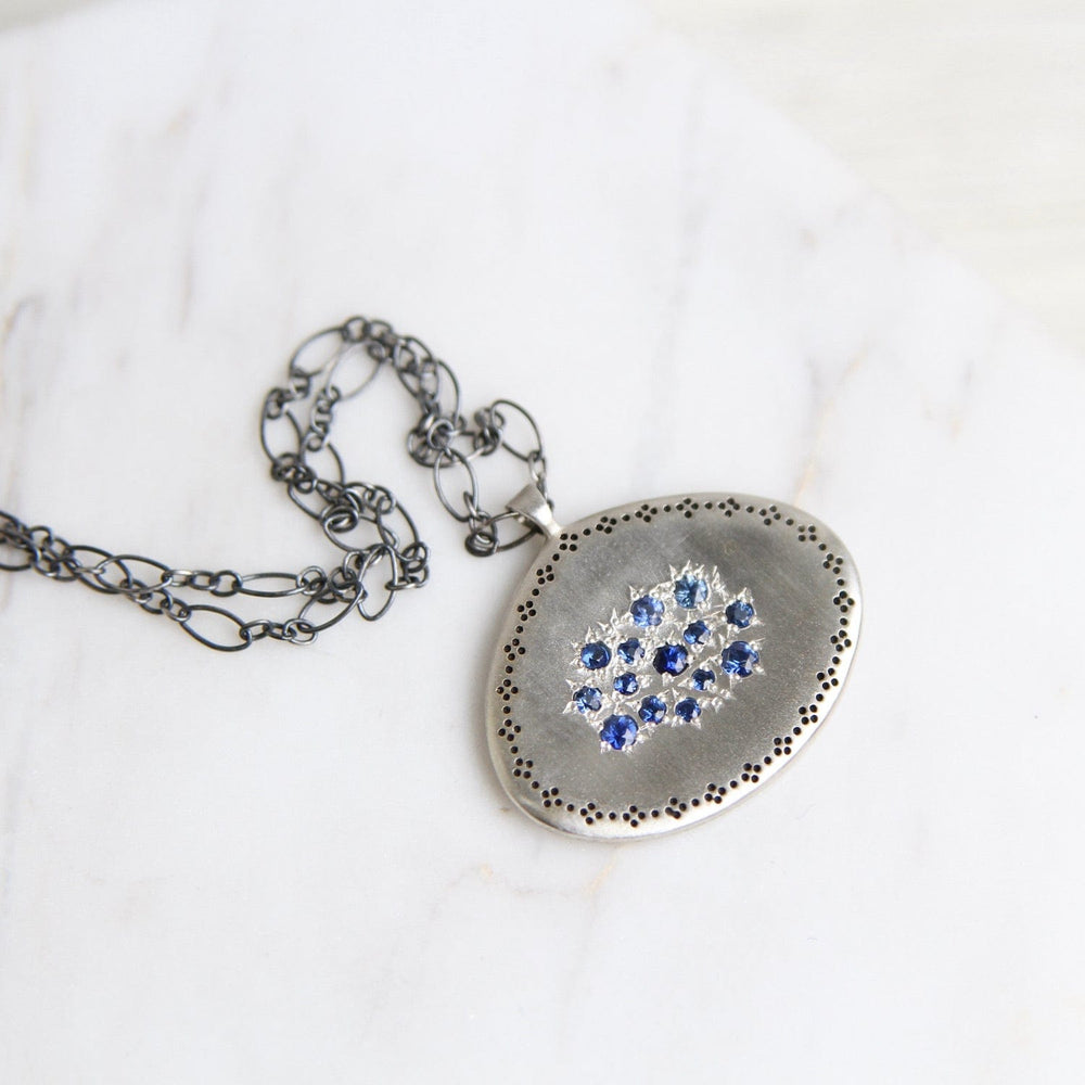 
                  
                    NKL Silver Lights Cluster Pendant in Sapphire
                  
                