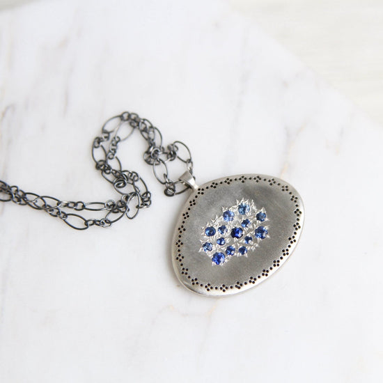 NKL Silver Lights Cluster Pendant in Sapphire