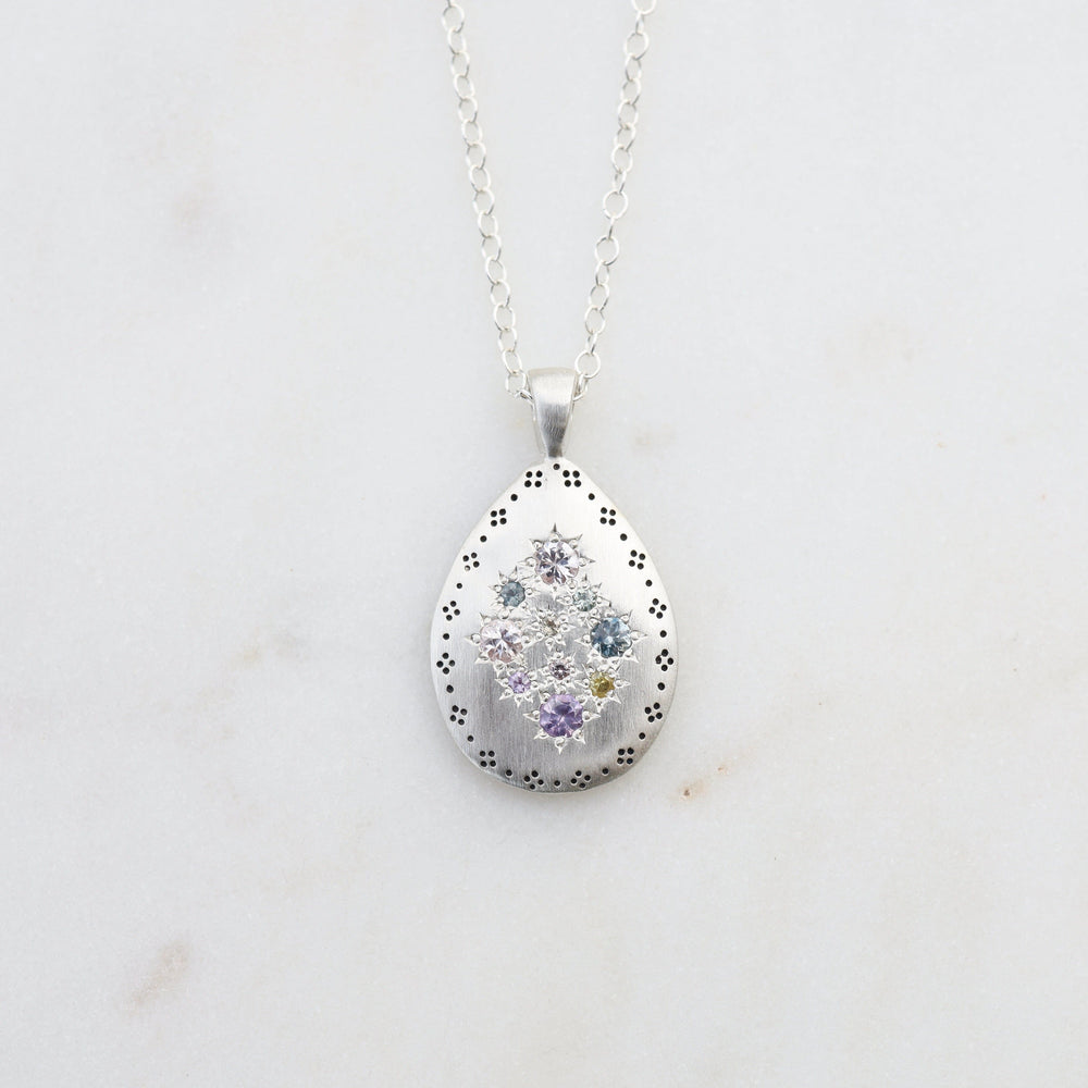 
                      
                        NKL Silver Lights Teardrop Pendant in Multi Sapphire
                      
                    