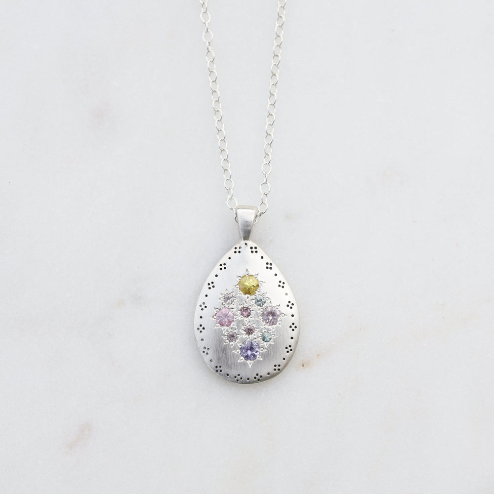 
                      
                        NKL Silver Lights Teardrop Pendant in Multi Sapphire
                      
                    