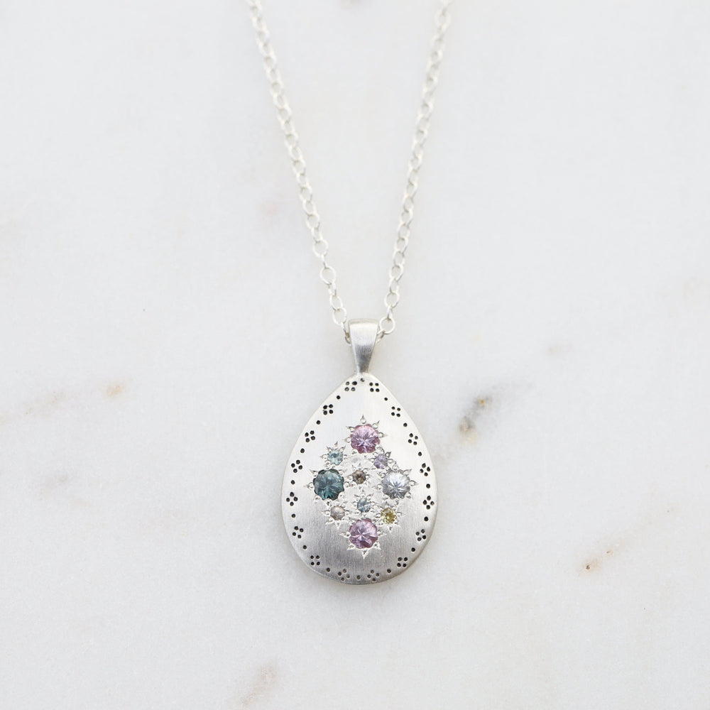 
                      
                        NKL Silver Lights Teardrop Pendant in Multi Sapphire
                      
                    