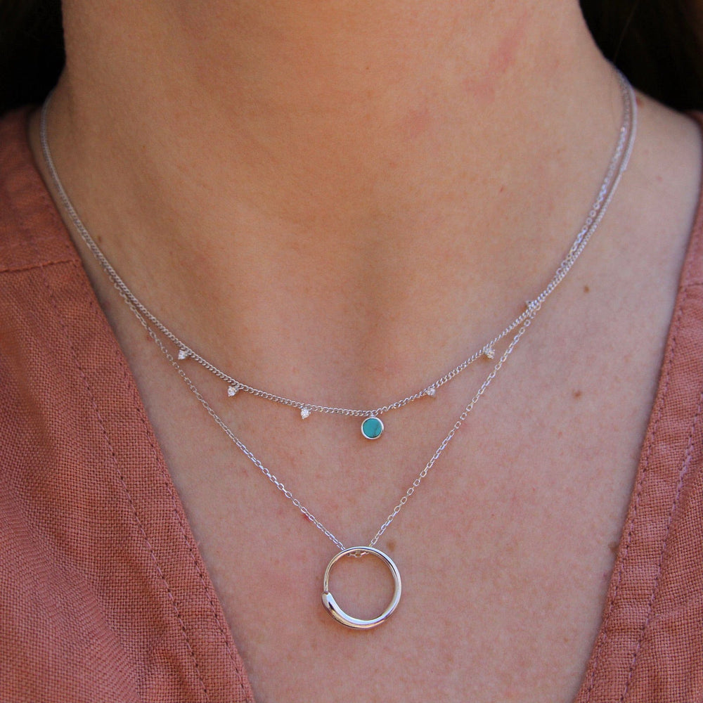 
                      
                        NKL Silver Luxe Circle Necklace
                      
                    