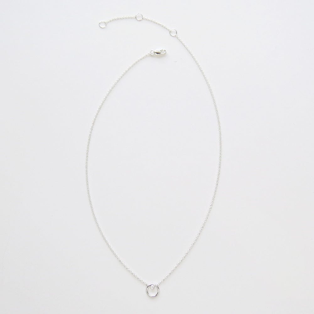 
                      
                        NKL Silver Ring Around The CZ Necklace
                      
                    