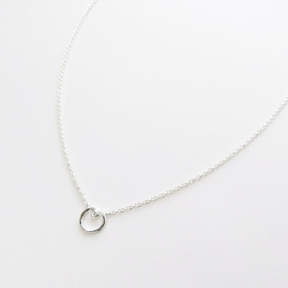 
                      
                        NKL Silver Ring Around The CZ Necklace
                      
                    