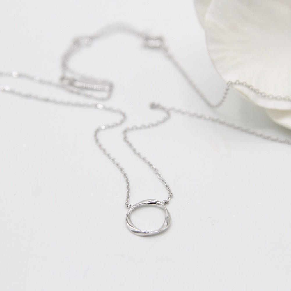 
                      
                        NKL Silver Swirl Necklace
                      
                    