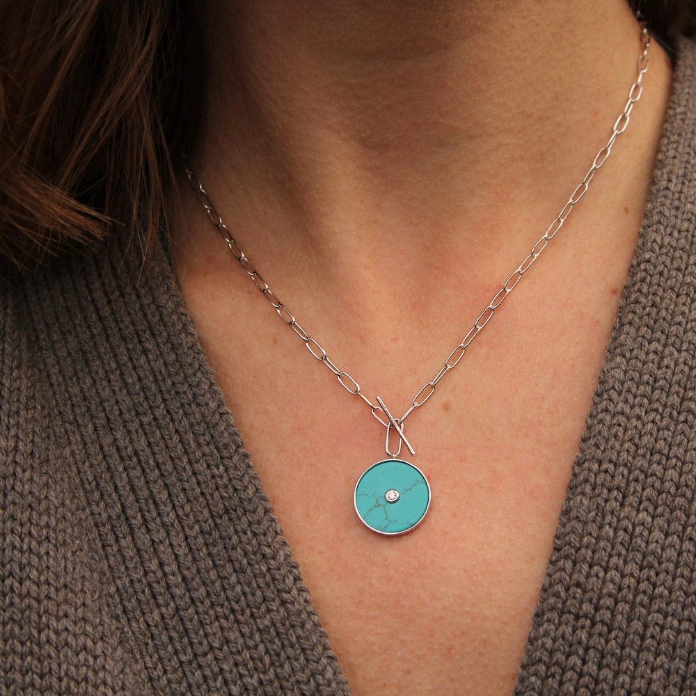 
                      
                        NKL Silver Turquoise T-bar Necklace
                      
                    