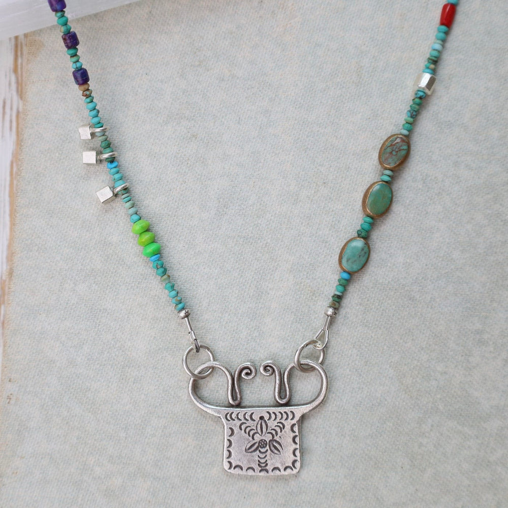 
                  
                    NKL Silver Turquoise Trilogy with Windmill Spirit Lock Necklace
                  
                