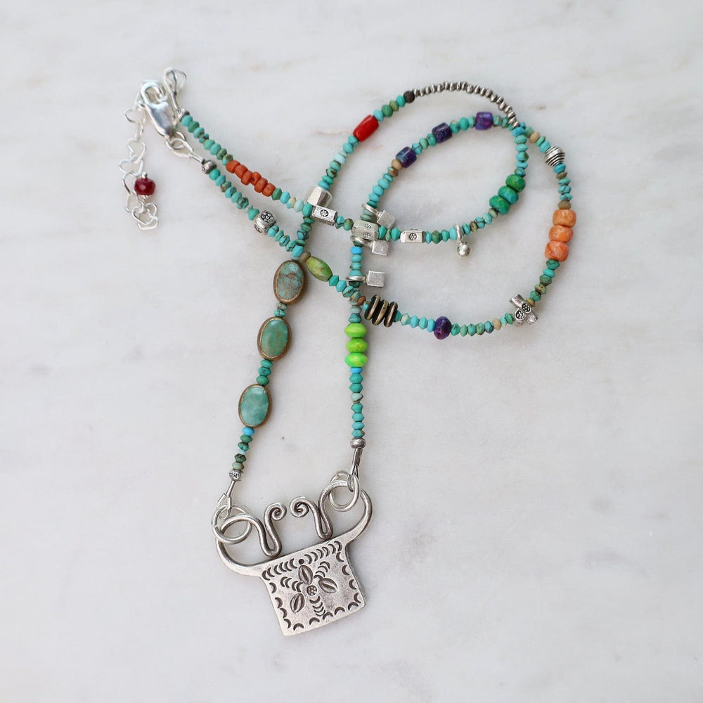 
                  
                    NKL Silver Turquoise Trilogy with Windmill Spirit Lock Necklace
                  
                