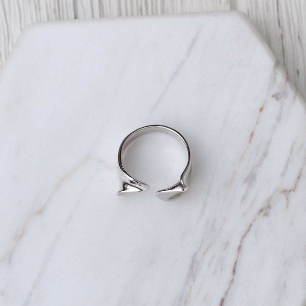 
                      
                        NKL Silver Twist Wide Adjustable Ring
                      
                    