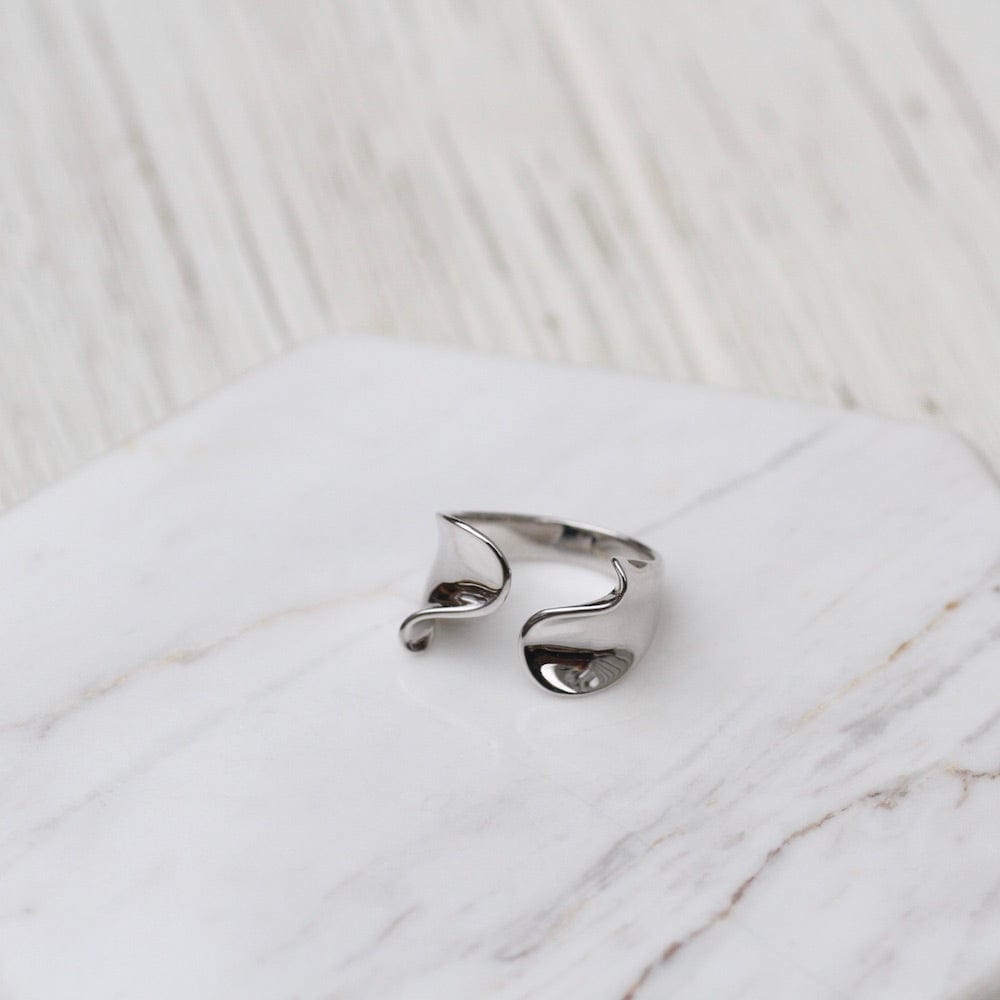 
                      
                        NKL Silver Twist Wide Adjustable Ring
                      
                    