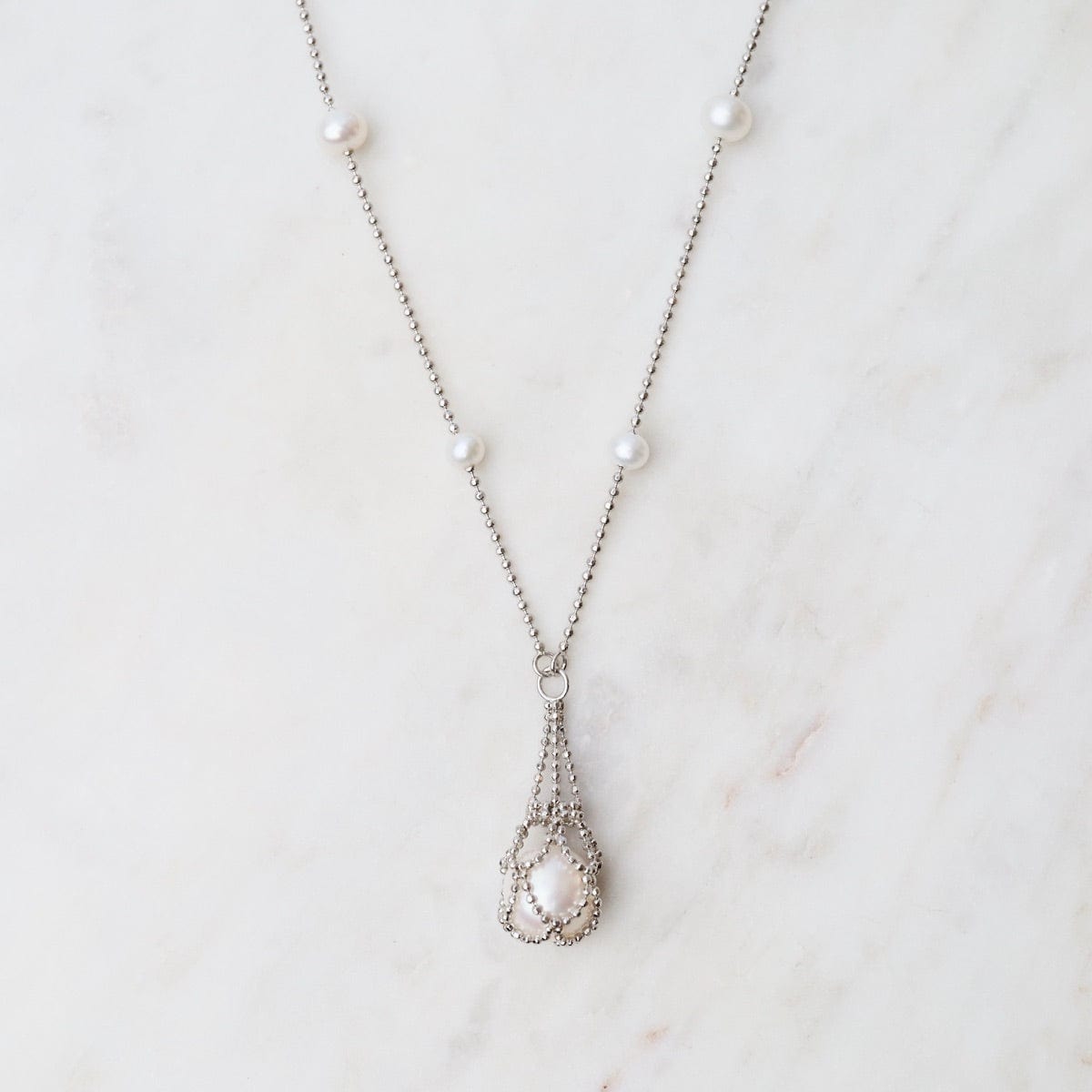 NKL Simple Pearl Stations with Captured White Pearl Necklace