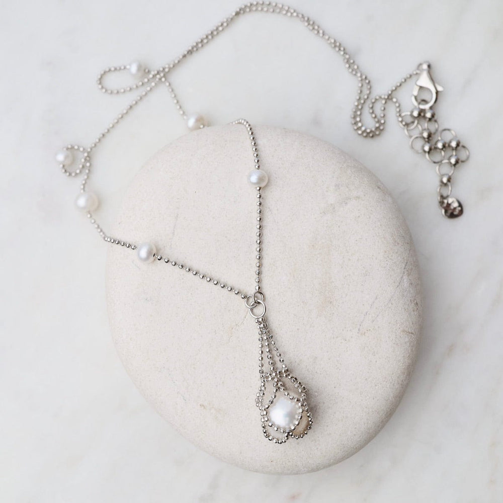 
                      
                        NKL Simple Pearl Stations with Captured White Pearl Necklace
                      
                    