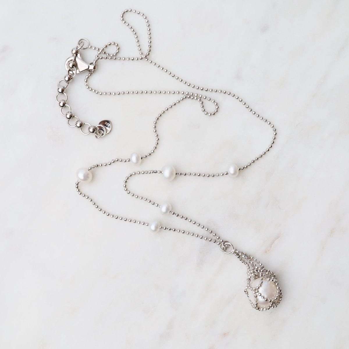 Simple Pearl Stations with Captured White Pearl Necklace