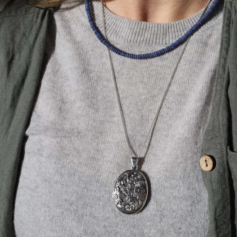 
                  
                    NKL Simple Stone Necklace with Saucer Shaped Lapis
                  
                