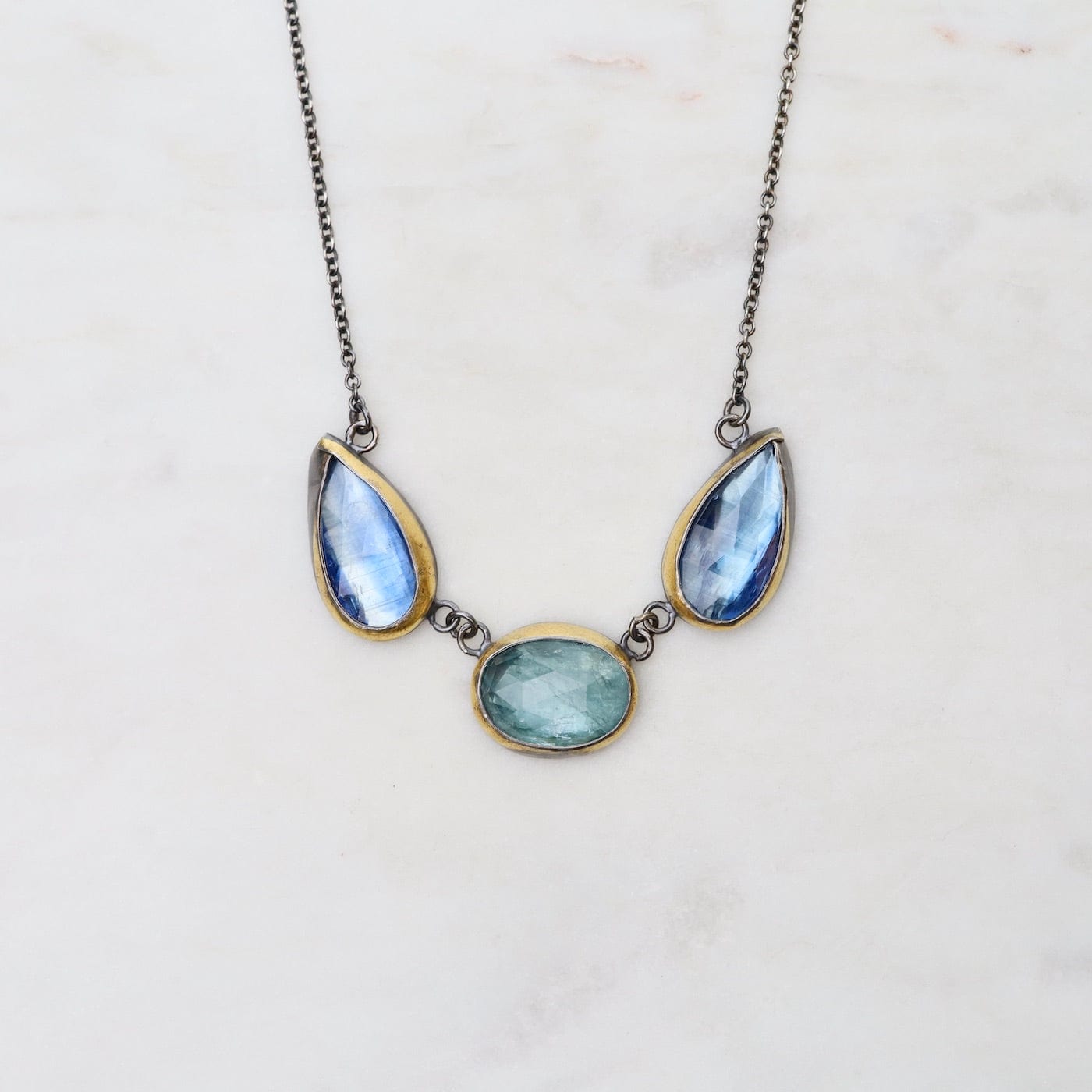 NKL Sky Blue Kyanite 3 Stone Teardrop & Oval Crescent Rim Necklace