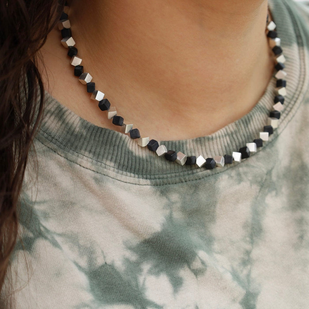 
                      
                        NKL Small Cube and Onyx Necklace
                      
                    