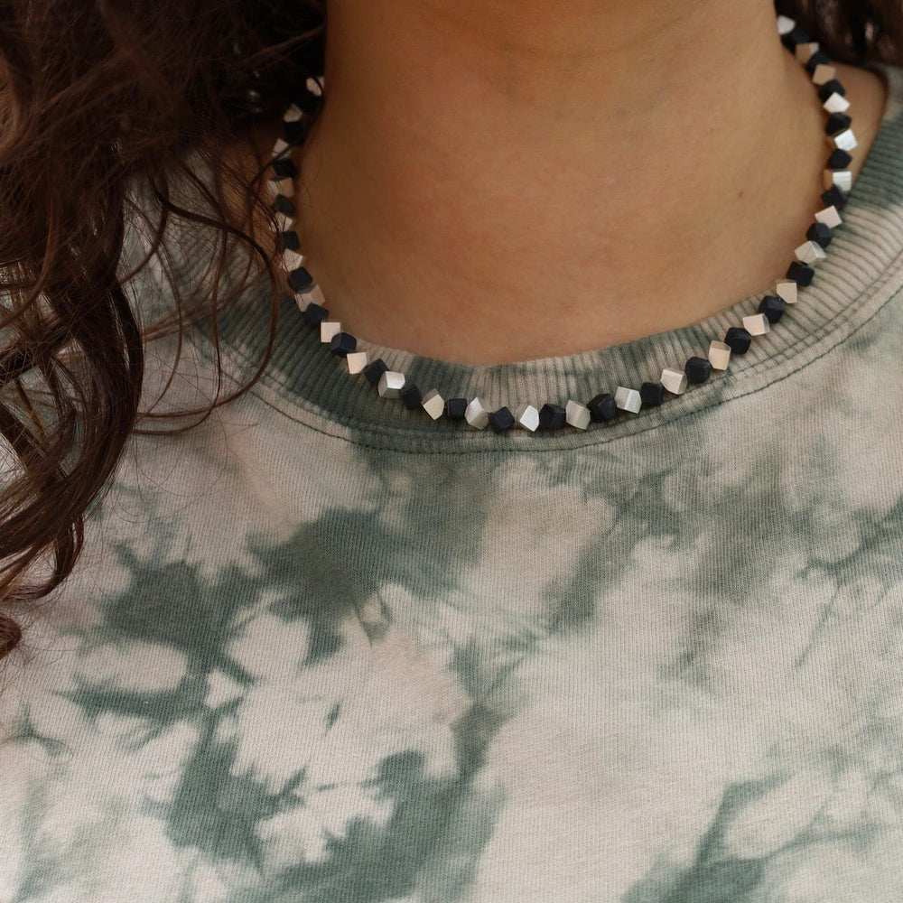 
                      
                        NKL Small Cube and Onyx Necklace
                      
                    