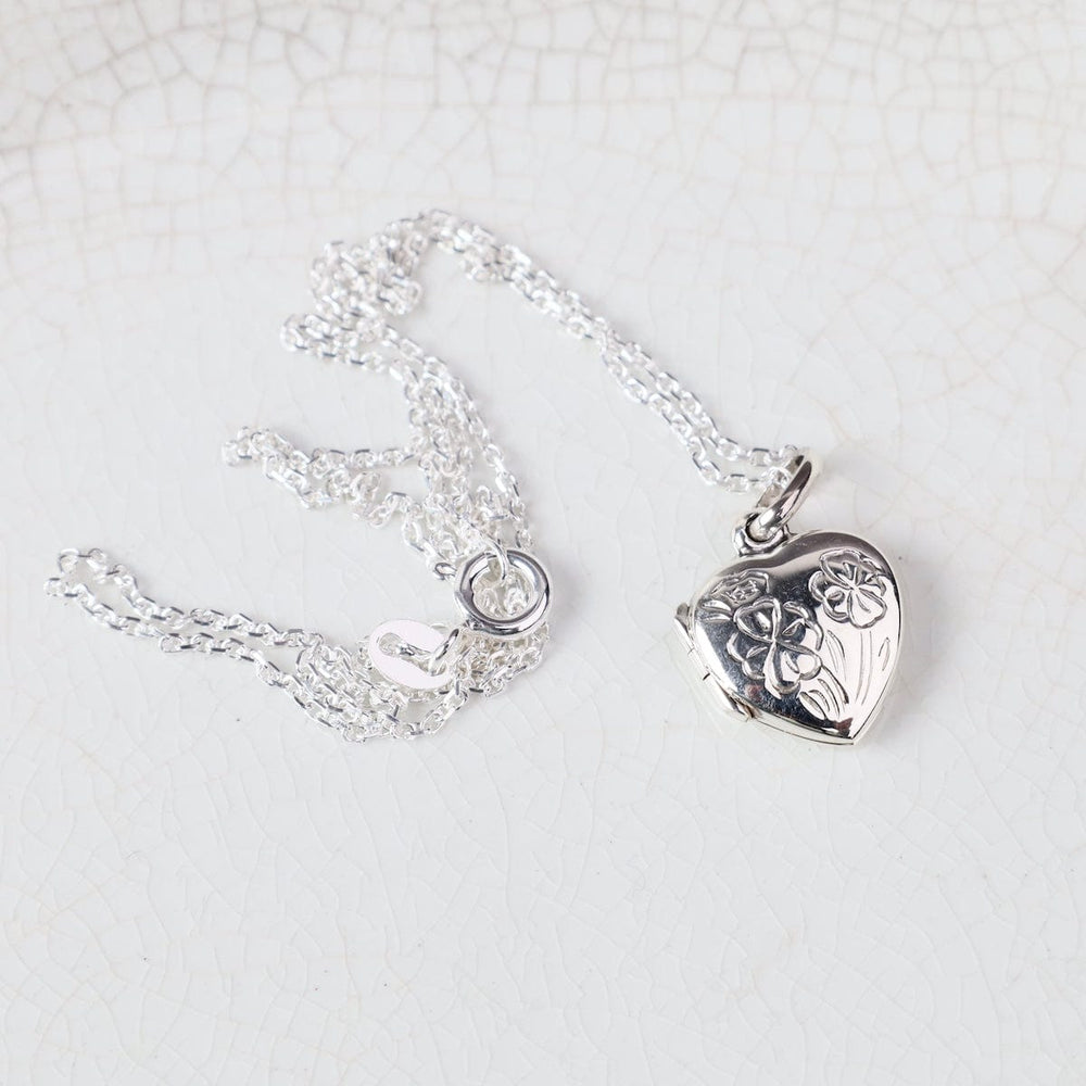 
                  
                    NKL Small Flower Etched Heart Locket Necklace
                  
                