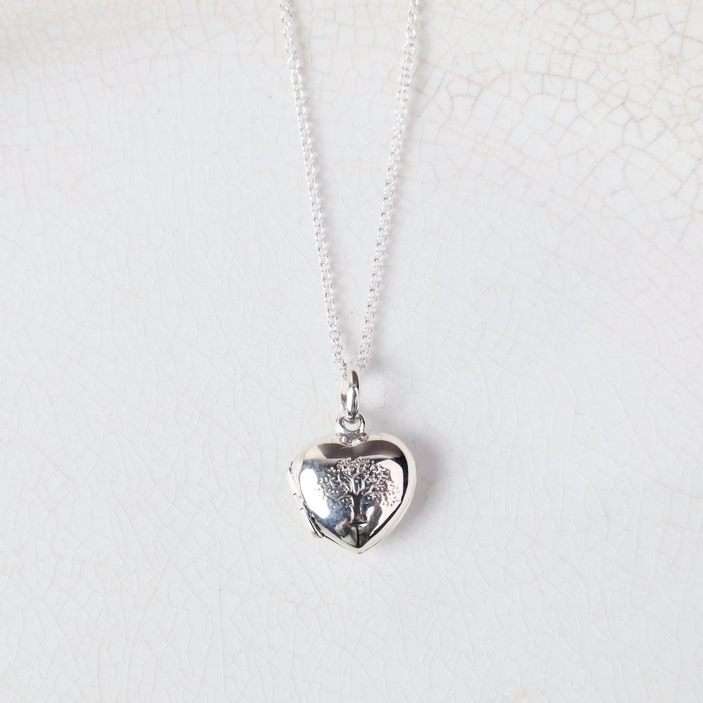 
                  
                    NKL Small Heart with Etched Tree of Life Locket Necklace
                  
                