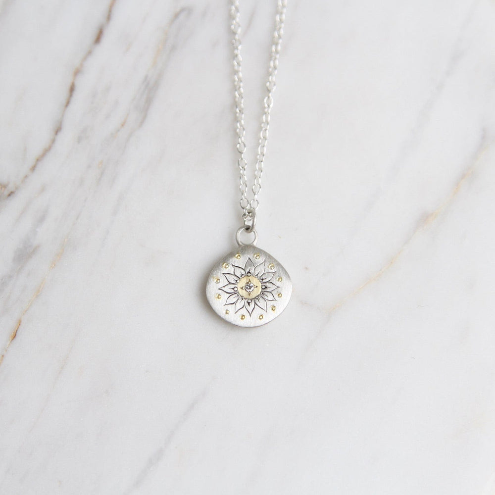 
                      
                        NKL Soleil Charm with Diamond
                      
                    