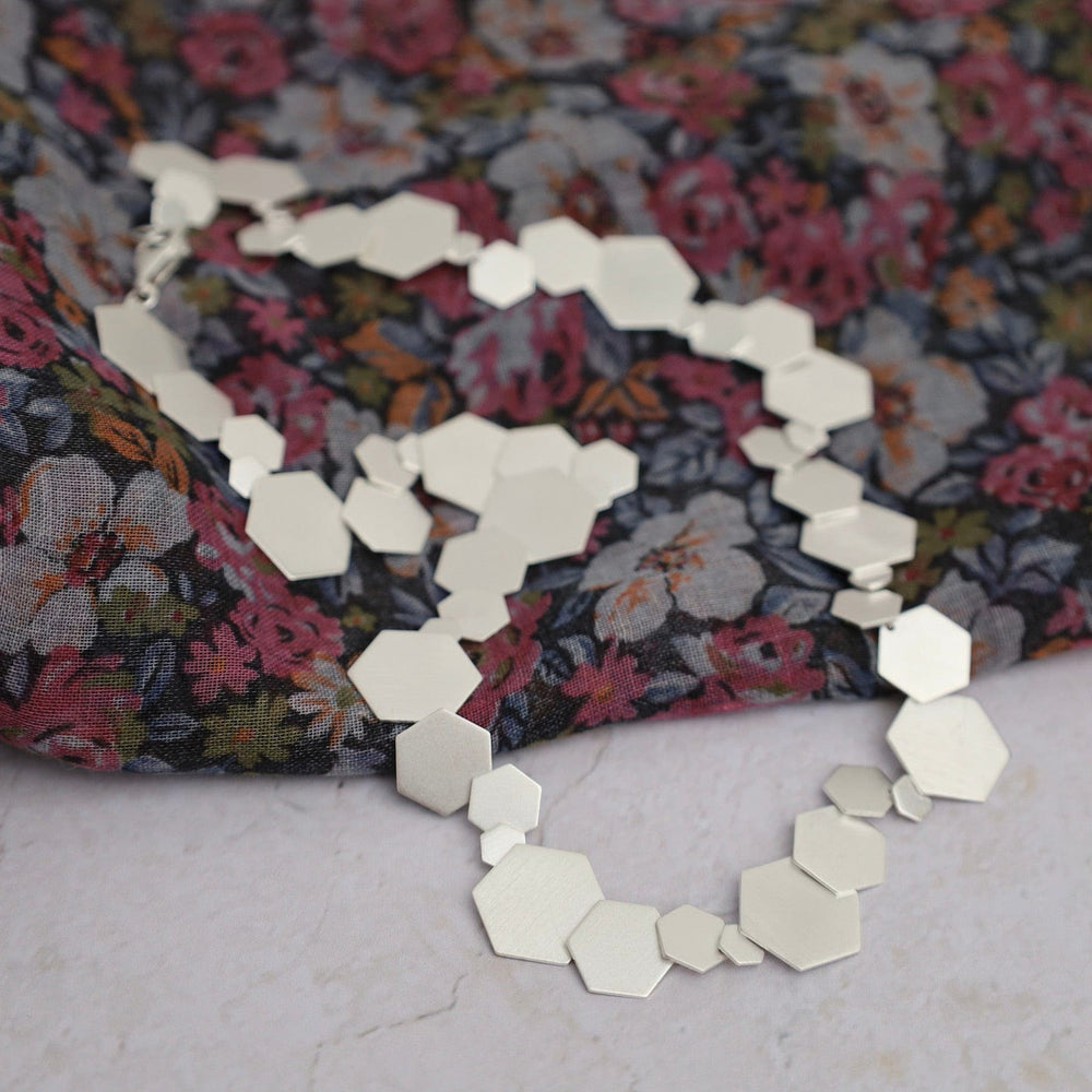 
                      
                        NKL Solid Hex Necklace
                      
                    