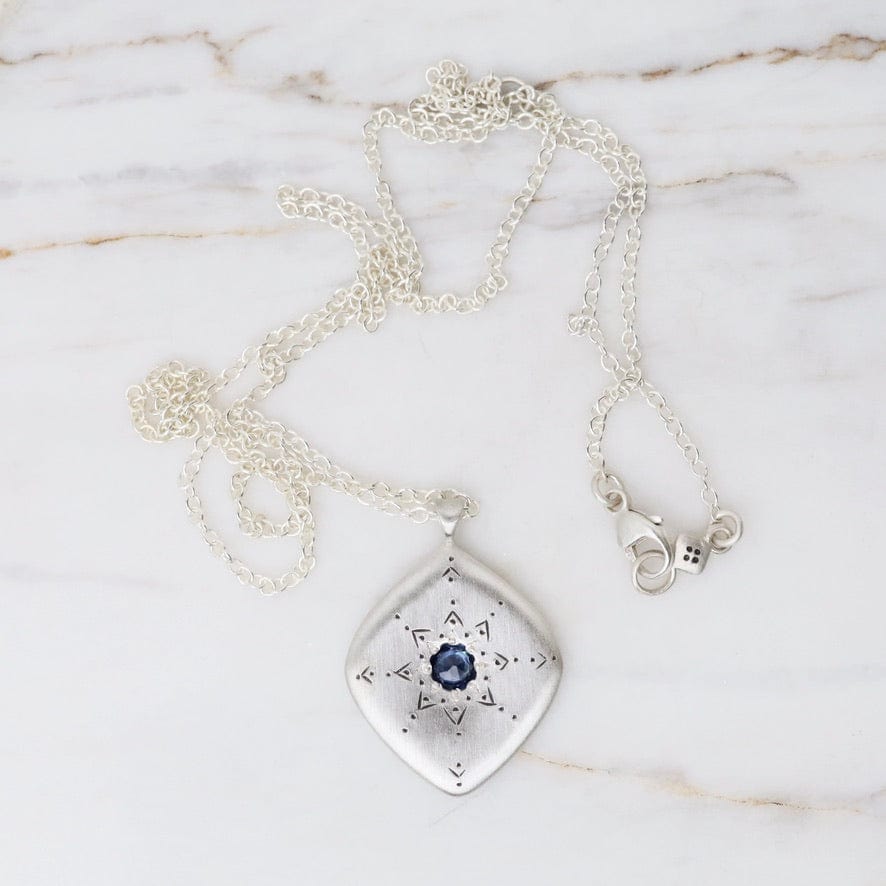 
                  
                    NKL Stargaze Pendant with Blue Sapphire
                  
                