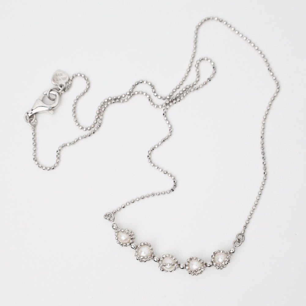 
                  
                    NKL Sterling 5 Captured Pearls Necklace
                  
                