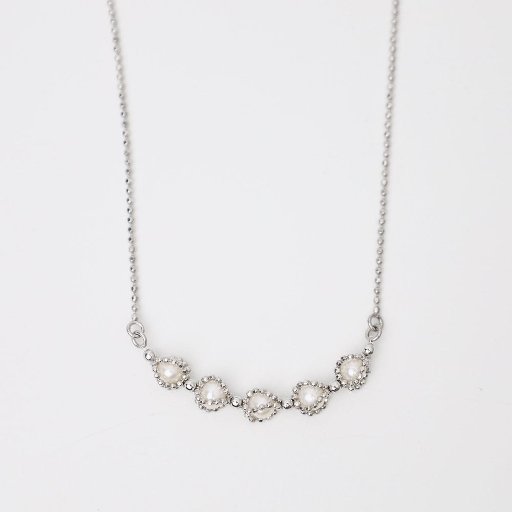 
                  
                    NKL Sterling 5 Captured Pearls Necklace
                  
                