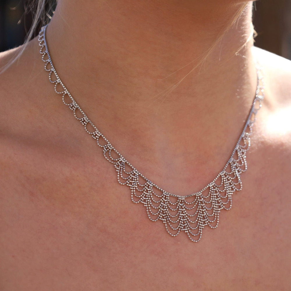 
                  
                    NKL Sterling Draped Lace Necklace
                  
                