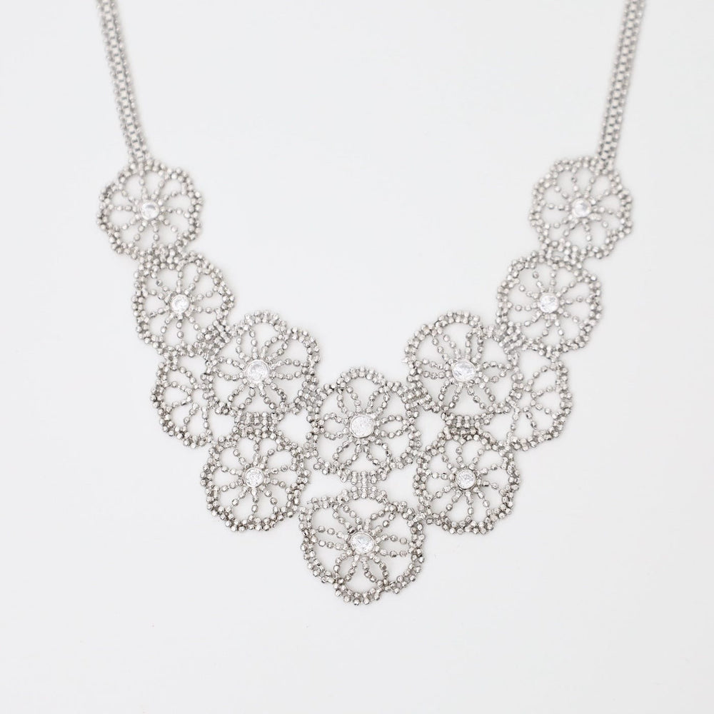 
                  
                    NKL Sterling Sand Dollar Lace & Cubic Zirconia Necklace
                  
                