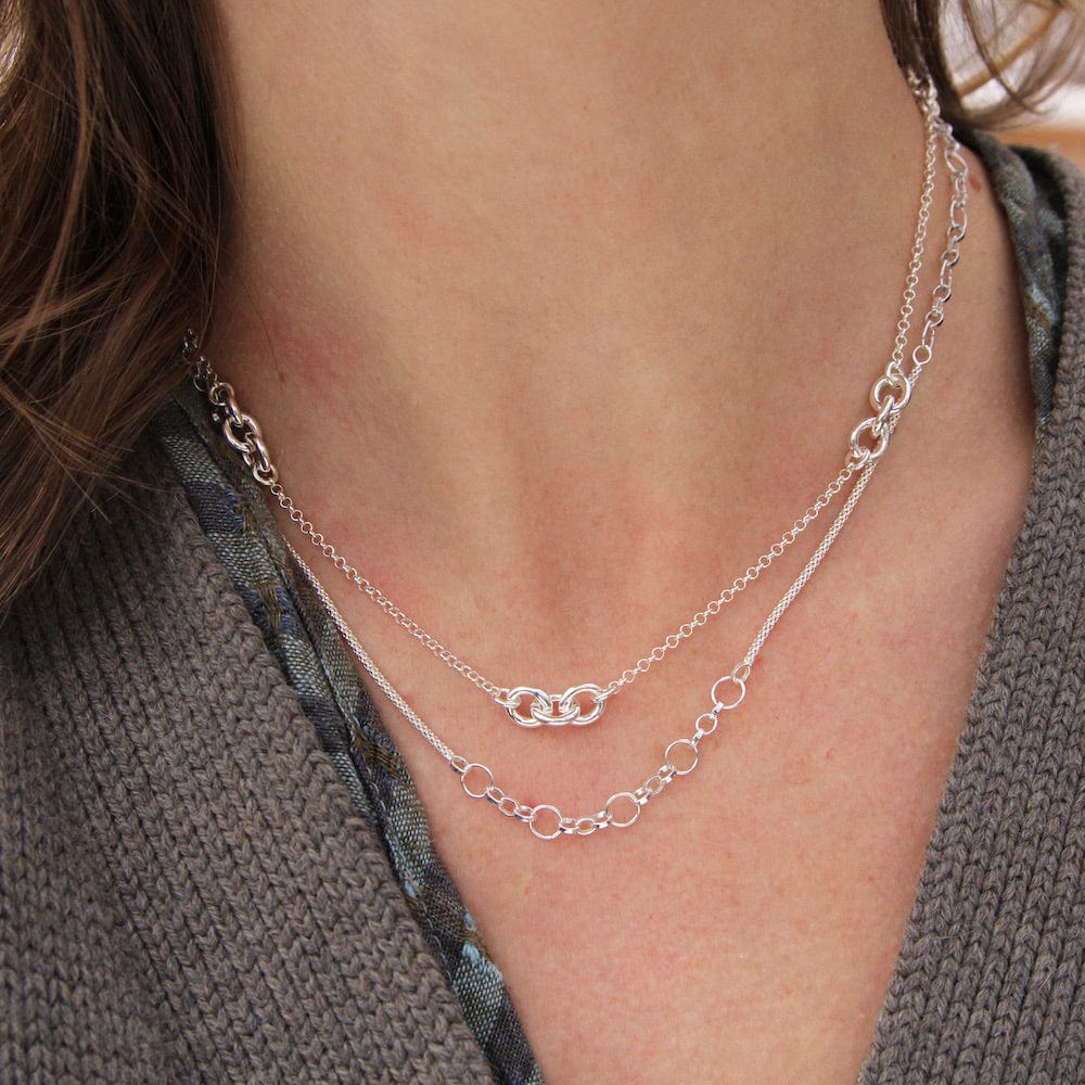 
                  
                    NKL Sterling Silver Chain with 3-Link Stations
                  
                