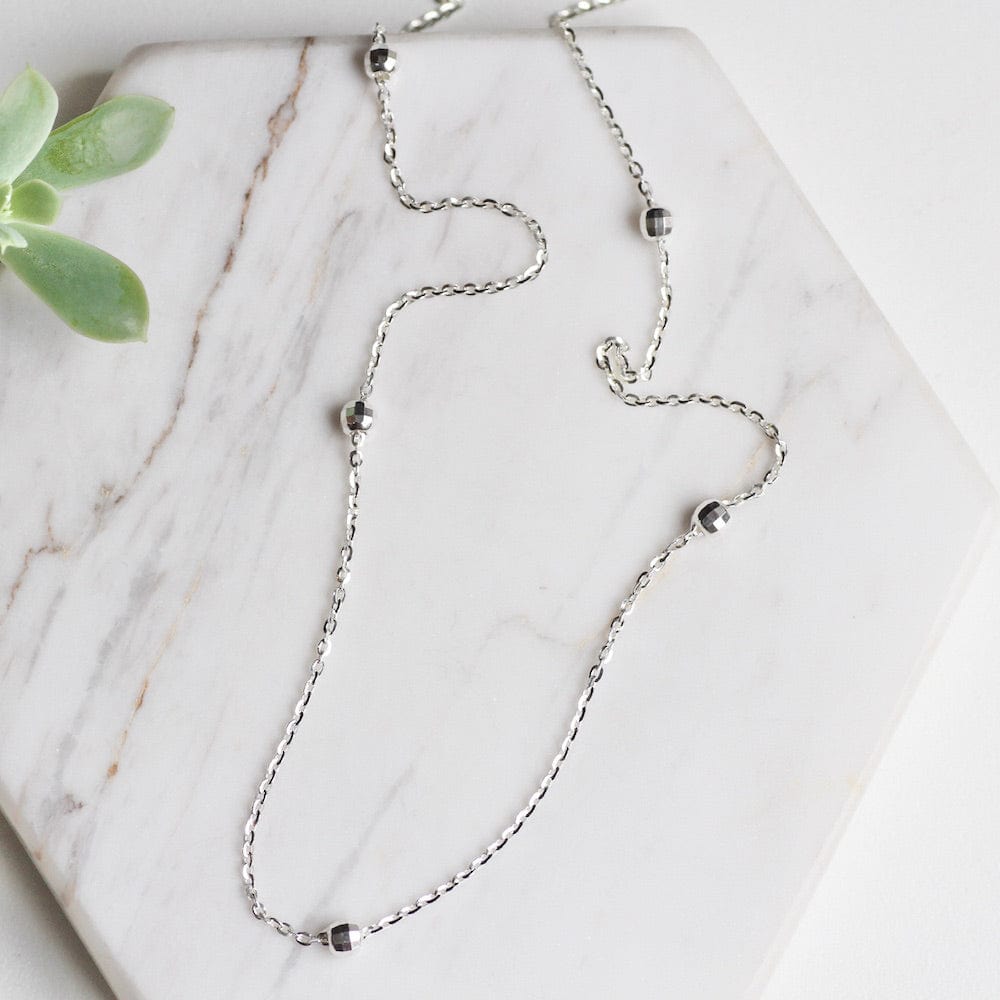 
                  
                    NKL Sterling Silver Chain with Disco Ball Stations
                  
                