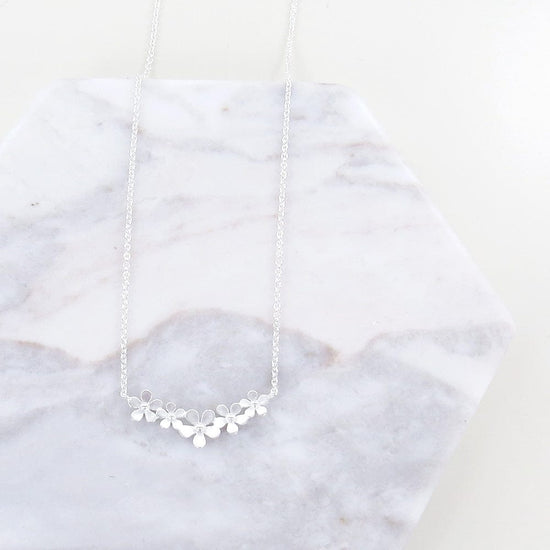 NKL Sterling Silver Curve of Forget-me-nots Necklace