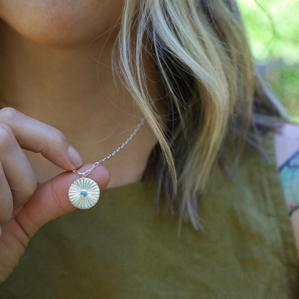 
                  
                    NKL Sterling Silver Disc Pendant with Turquoise
                  
                