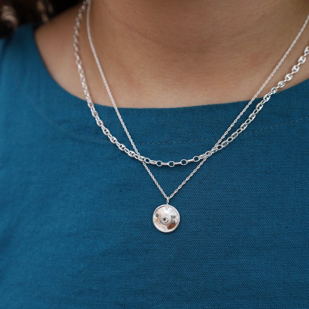 NKL Sterling Silver Dotted Dome Disc with White Topaz Necklace