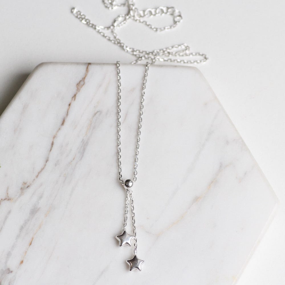 
                  
                    NKL Sterling Silver Double Star Drop Necklace
                  
                