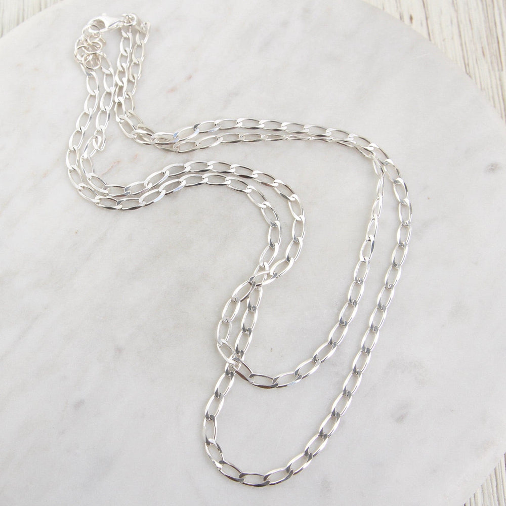 
                  
                    nkl Sterling Silver Double Strand of 4.2mm Flat Curb Chain
                  
                