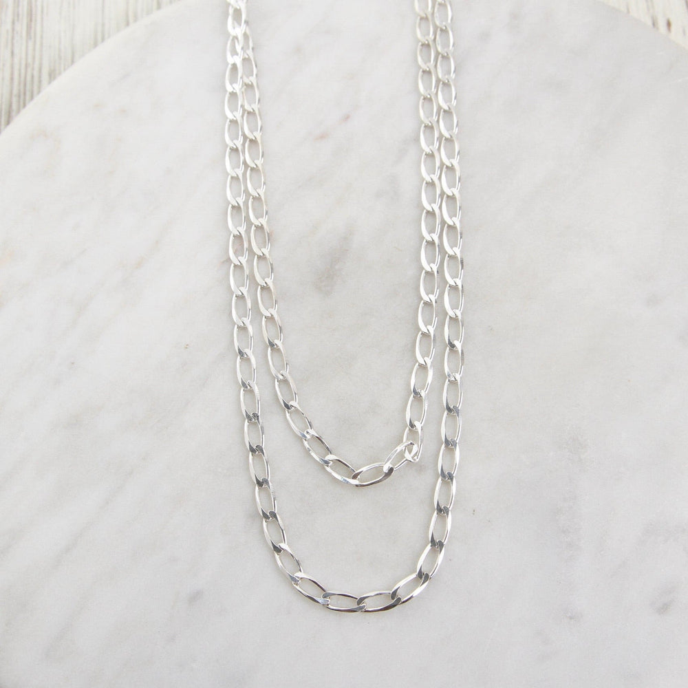 
                  
                    nkl Sterling Silver Double Strand of 4.2mm Flat Curb Chain
                  
                