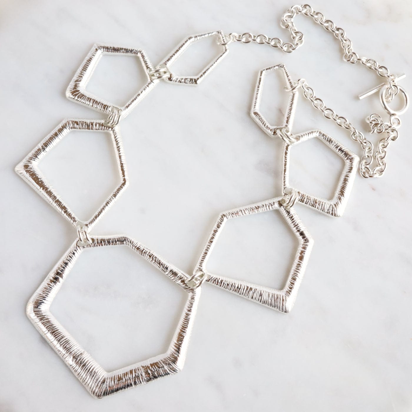 NKL Sterling Silver Graduating Geometric Shapes Necklace