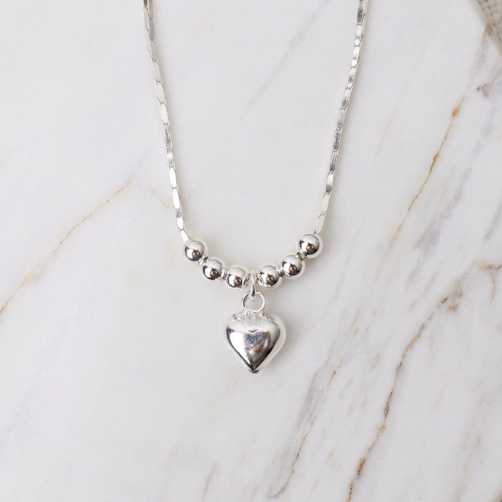 
                      
                        NKL Sterling Silver Heart and Beads Necklace
                      
                    